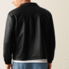 Mens black faux leather shirt jacket back view Back view of mens faux leather shirt jacket in black stylish PU design with long sleeves