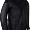 Side view of men’s black leather shirt jacket with dual chest pockets and button closure